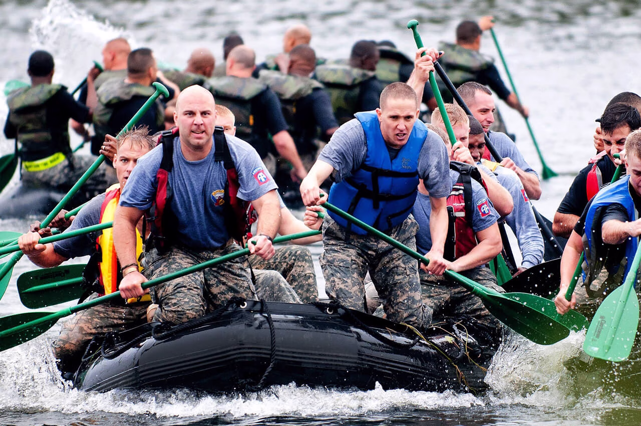 men-paddling-in-in